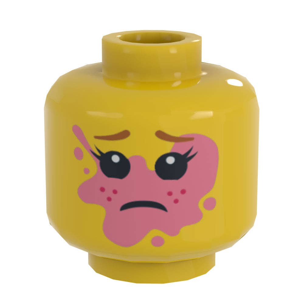 B3 Customs® Minifig Head: Girl Popped Bubble Gum on Face (Classic Yellow)